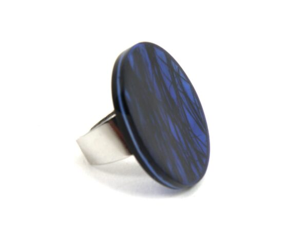 Ring laminiertes Perlmutt blau mit schwarzen Linien